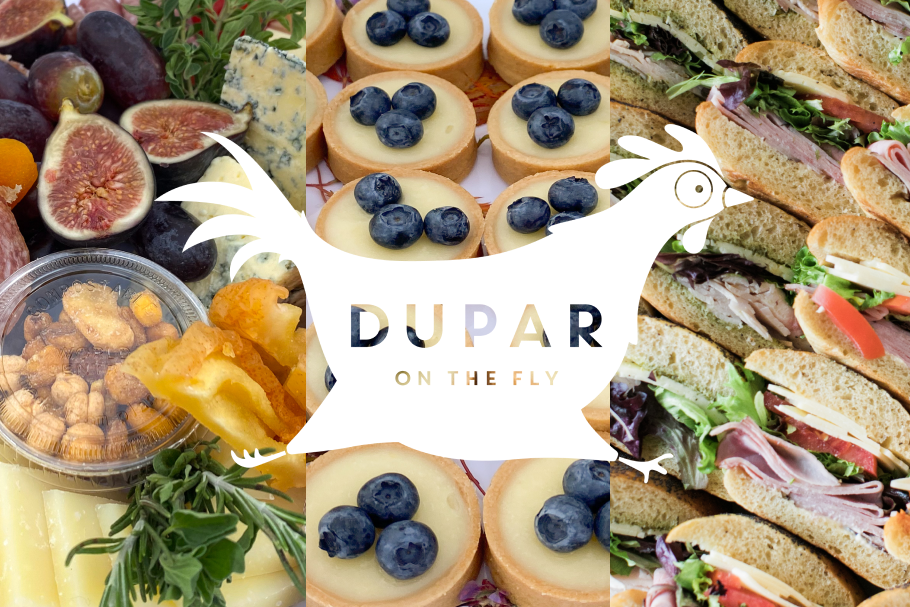 Seattle Catering Collage of a cheese board, blueberry tarts, and sandwiches. The central overlay features the text "Dupar on the Fly" with a chicken silhouette.