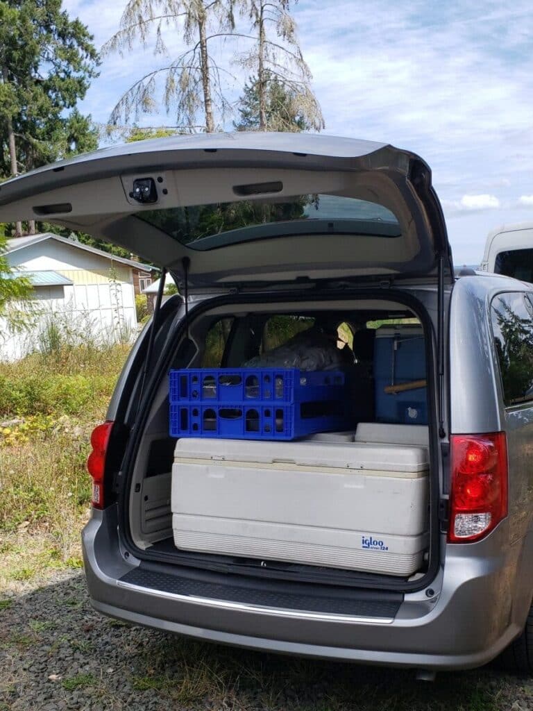Catering van packed with coolers and event supplies for an off-site Lisa Dupar Catering event